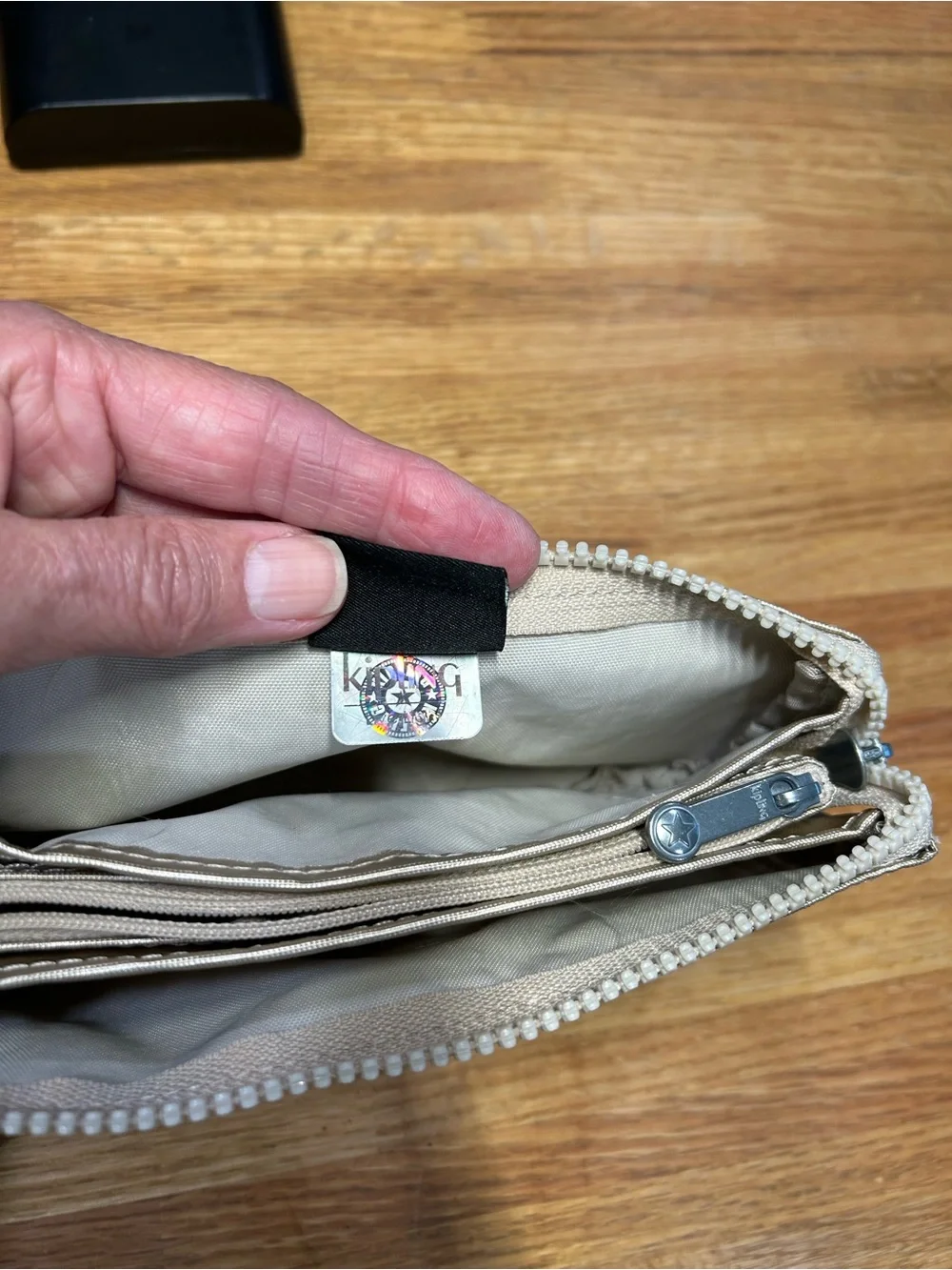 Kipling Metallic Silver Cosmetic Pouch with Monkey Charm